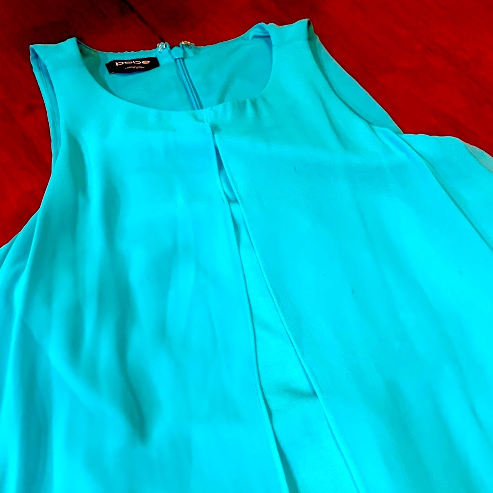 Absolutely stunning double fashionable Bebe Turquoise Zip-Back Top dress, size M